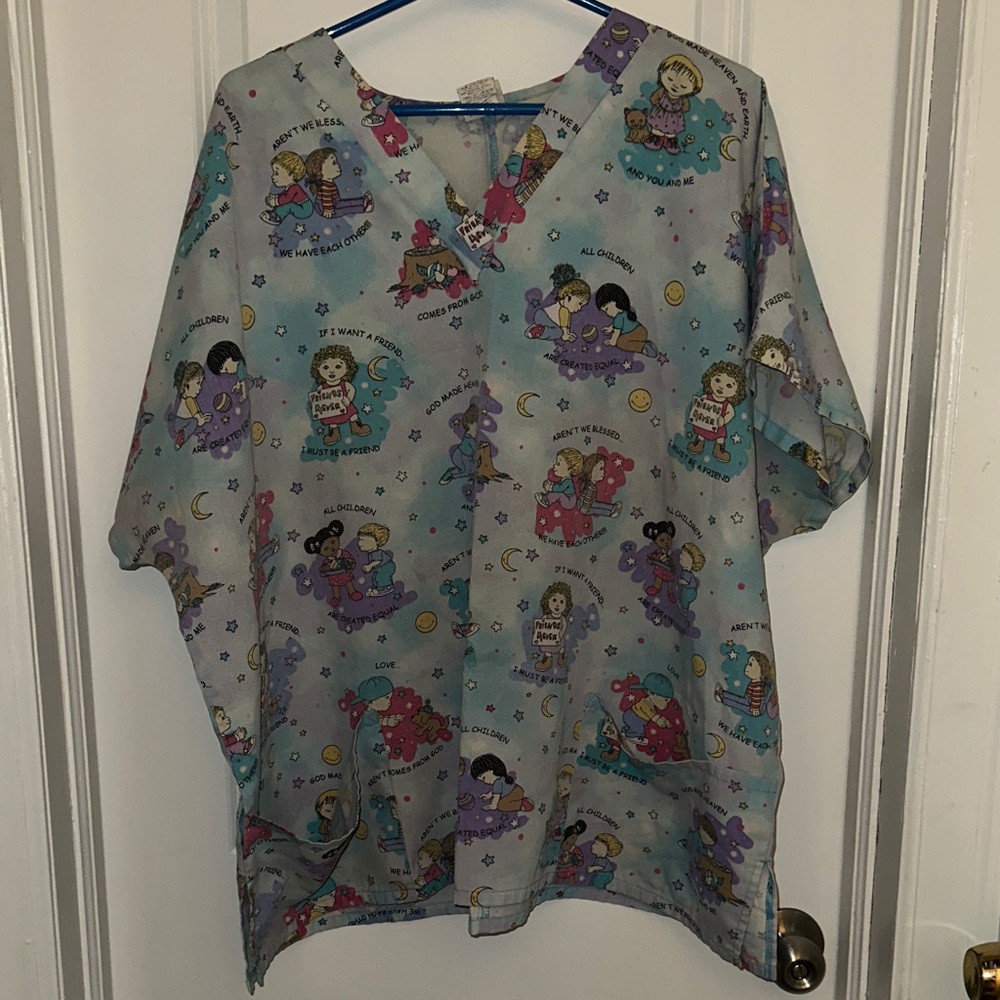Women’s scrubs Top with Pastel Blue Cartoon Print